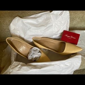 Roger Vivier classic pumps in creamy yellow.